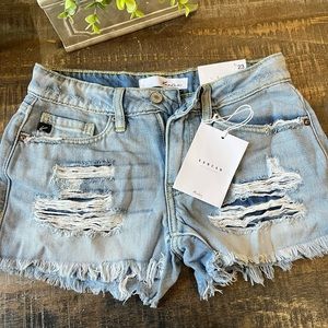 Size 23 Distressed Kancan shorts